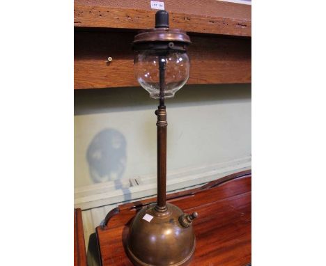 A brass Tilley lamp with original glass shade&nbsp;