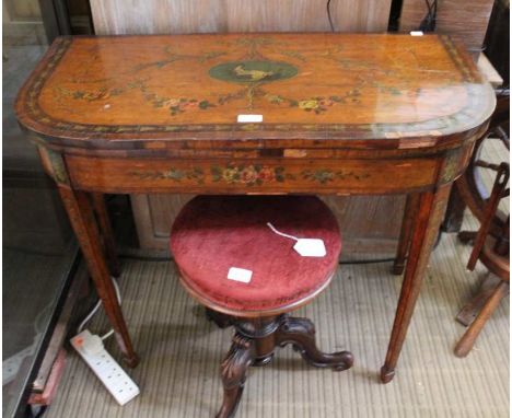 An early 19th century principally satin wood Sheriton design foldover card table, the central cartouche depicting a lady on a