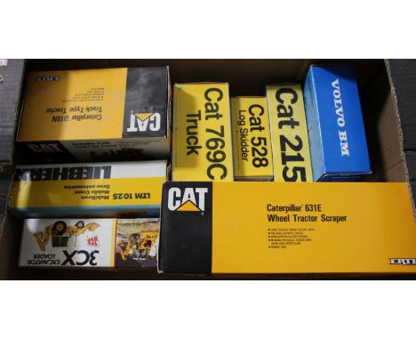 Eight various boxed Diecast vehicles to include Caterpillar 631E Wheel Tractor Scraper, Caterpillar D10N Track-Tyre Tractor, 