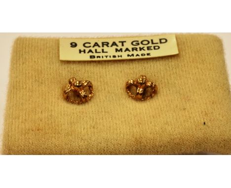 TWO PAIRS OF 9CT GOLD EARRINGS INCLUDING A PAIR OF RUBY AND DIAMOND CLUSTER STUD EARRINGS each cluster centred with a tiny ei