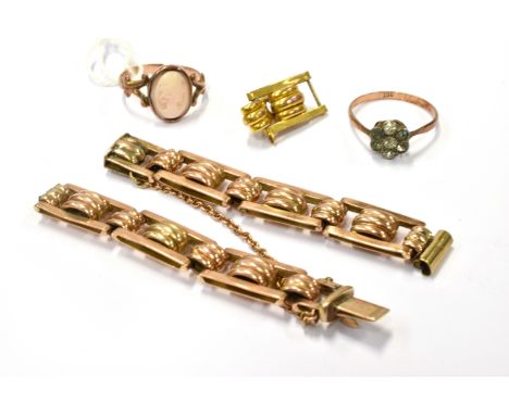 AN EARLY 20TH CENTURY ROSE GOLD WATCH BRACELET AND A TWO RINGS The bracelet in the form of spools within open rectangular lin