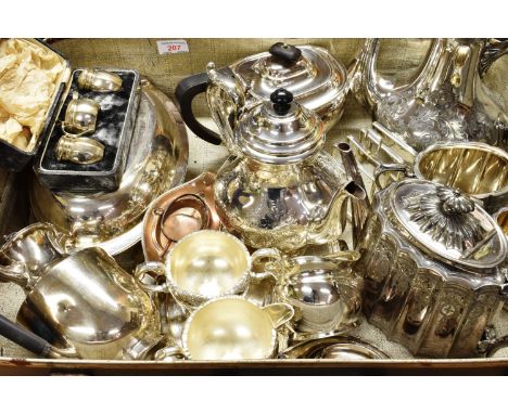 A COLLECTION OF PLATED HOLLOW WARES TO INCLUDE A FACETTED ROUND THREE PIECE CRUET SET, IN A CASE a concave-fluted oval teapot