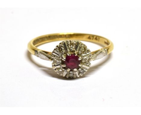 AN 18CT GOLD AND SMALL RUBY AND DIAMOND CLUSTER RING Centred with a small round mixed-cut ruby claw set within a tiny eight-c