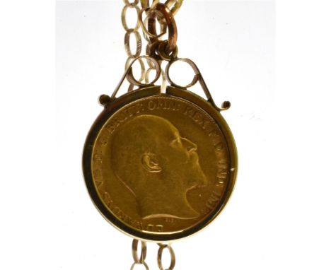 A HALF-SOVEREIGN, 1905, LATER MOUNTED AS A PENDANT WITH A CHAIN The mount London 1966, the trace-link chain on a bolt-ring cl