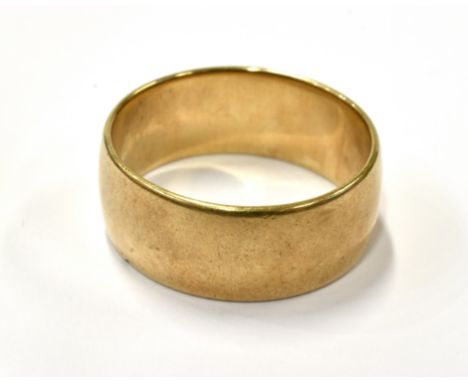 A 9CT GOLD BROAD BAND RING the 9mm wide band of shallow 'D' section, Birmingham 1956, size W, 8g gross 