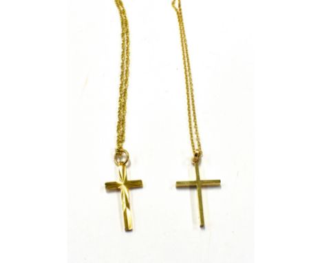 TWO 9CT GOLD SMALL LATIN CROSS PENDANTS AND CHAINS one cross with diamond-cut decoration, London 1979, approx. 23mm high over