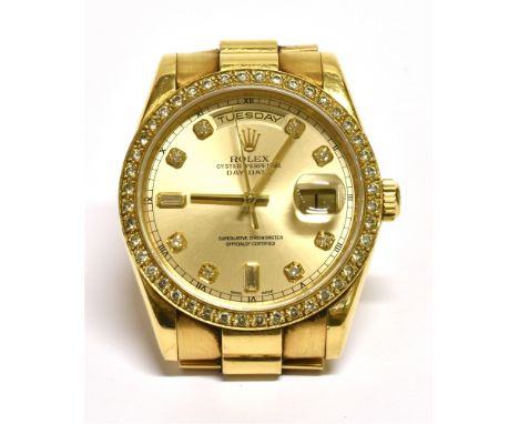 ROLEX, OYSTER DAY-DATE, A GENTLEMAN'S SWISS 18CT GOLD BRACELET WATCH, CIRCA 2001 Ref; 118238, No. K987166, brushed silvered d