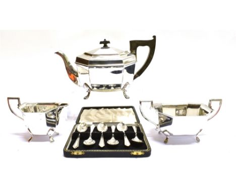 A SILVER THREE PIECE CANTED-RECTANGULAR TEA SERVICE AND A SET OF TEA SPOONS the tea set with angular handles on pad feet, the