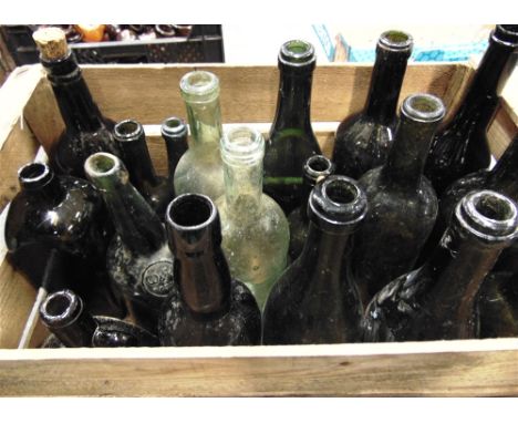 BREWERIANA - A COLLECTION OF 19TH CENTURY DARK OLIVE-GREEN WINE &amp; GIN BOTTLES mostly with 'kick-up' bases and string-rims