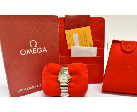 OMEGA, CONSTELLATION, A LADY'S STAINLESS STEEL AND GILT QUARTZ BRACELET WATCH  circa 2012, ref 136 17100, mother of pearl dia