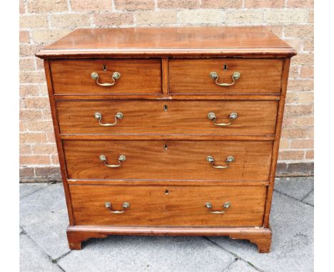 A MAHOGANY CHEST OF TWO SHORT AND THREE LONG DRAWERS  on bracket feet, 97cm wide