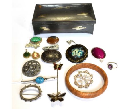 A SMALL GROUP OF COSTUME JEWELLERY INCLUDING TWO OVAL AGATE BROOCHES a hardwood slave bangle; a silver and oval turquoise col