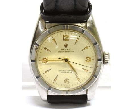 ROLEX, OYSTER PERPETUAL 'BUBBLEBACK', A MID-SIZE STAINLESS STEEL WRIST WATCH  circa 1950, ref; 6015, no.681089, cream dial wi