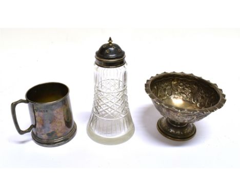 A MODERN SILVER CHRISTENING MUG, A SILVER SUGAR BOWL ON FOOT AND A SILVER MOUNTED GLASS SUGAR CASTER the straight-tapering mu