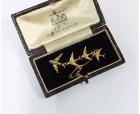 Edwardian 15ct gold seed pearl swallows brooch, 5.5cm long 