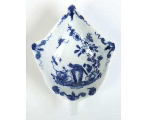 A Worcester leaf moulded pickle dish. Painted in underglaze blue with the Two-Peony Rock Bird Pattern. Workman's mark c1758-6