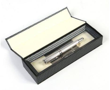 A boxed and unused Chopard fountain pen with 18 carat gold nib and knurled case.  Condition Report. To be used as a guide onl
