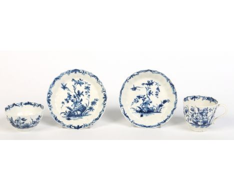 A Worcester coffee cup, tea bowl and two saucers of faceted form and painted in underglaze blue with the Hollow Rock Lily pat