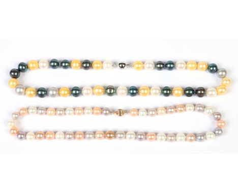 Two cultured pearl necklaces. One with a 14 carat white gold clasp and having white, yellow and blue pearls, the other with 1