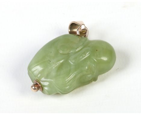 A Chinese carved jade pendant of Shou Lao with 9 carat gold mounts, 4cm Condition Report. To be used as a guide only. Good co