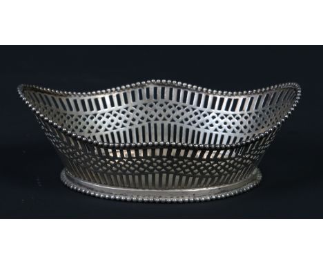 A Dutch silver bon bon dish of pierced basket form and with beaded rim. Date letter K for 1920. 91.14 grams, 13cm wide.  Cond