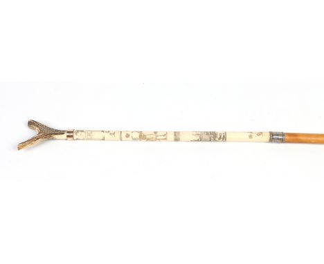 An assembled antler, bone and malacca thumb stick, 128 cm. 