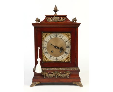 A German mahogany and gilt metal bracket clock. With square brass dial having silvered chapter ring. Housing a two train eigh