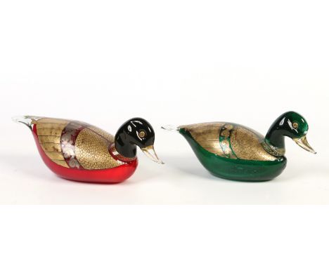 A pair of Murano style art glass models of ducks. One emerald and the other ruby in colour with gilt and silvered decoration.