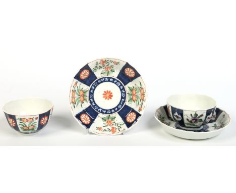 Two Worcester faceted teabowls and saucers. Decorated with alternating panels of flowers and blue grounds, one European and o