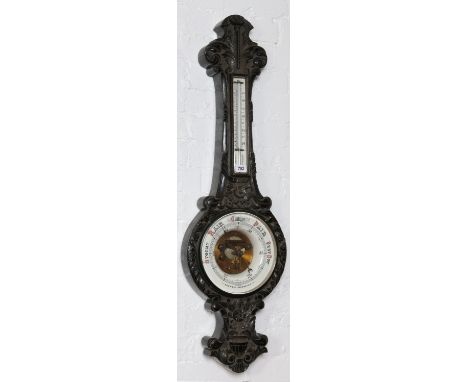 A Victorian carved and ebonized banjo barometer with white glazed pottery dials, 114cm. 