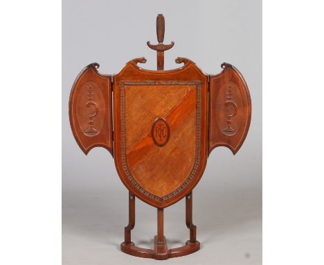 An Edwardian carved and inlaid oak tryptic folding firescreen in memoration of the Royal Flying Corps. Along with original de