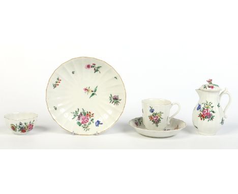 A collection of Worcester tea wares decorated in coloured enamels with bouquets and scattered sprigs with gilt rims. Comprisi
