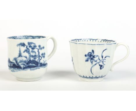 Two Worcester coffee cups painted in underglaze blue. One painted with the cannonball pattern, the other cup faceted and deco