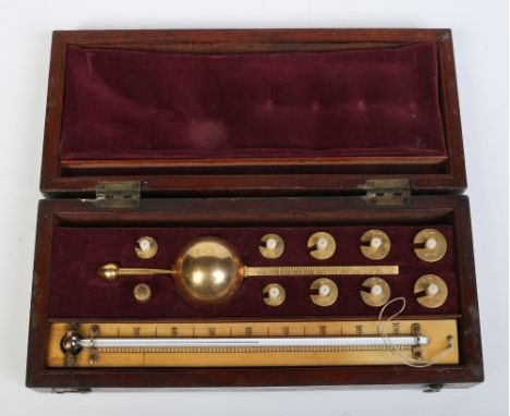 A Victorian mahogany cased brass and ivory Sikes hydrometer by makers J. Mc Glashan & Co, Glasgow.  Condition Report. To be u