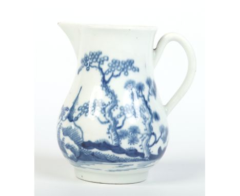 A Worcester baluster shaped sparrow beak cream jug with grooved loop handle. Painted in underglaze blue with the Cannonball p