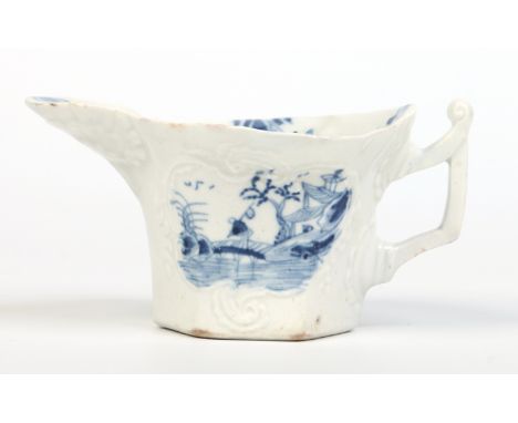 A rare Worcester flared hexagonal cream boat, with a square section handle having upturned thumb rest and a geranium leaf mou