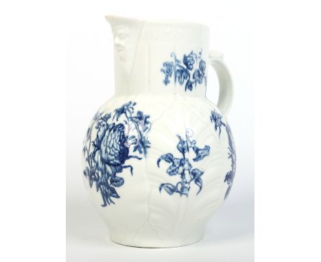 A Worcester cabbage leaf moulded mask jug. Printed in underglaze blue with the Natural Sprays Group. Crescent mark c1765, 19.