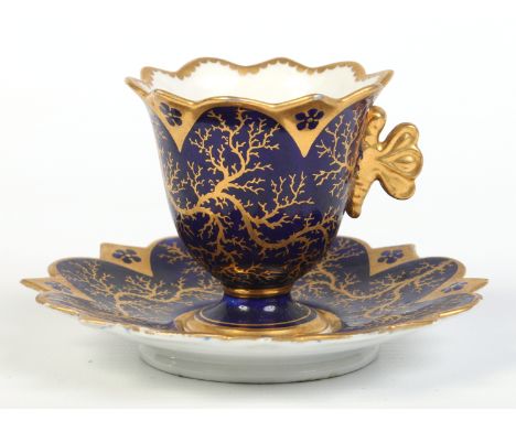 A Worcester Flight, Barr & Barr cabinet cup and saucer with egg and dart moulded rims and having butterfly moulded handle. Gr