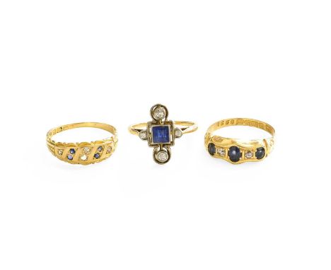 An 18 Carat Gold Sapphire and Diamond Five Stone Ring, three oval cut sapphires spaced by old cut diamonds, in yellow claw se