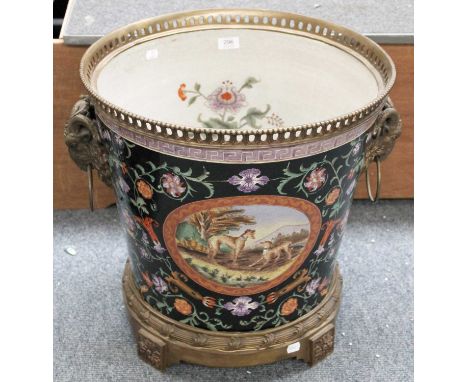 A Large Reproduction Gilt Metal Mounted Porcelain Planter, decorated with vignettes of hounds on a floral and black ground, w