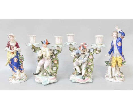 A Pair of Sitzendorf Porcelain Figural Twin Light Candelabra, 19th Century, each modelled as harlequin teasing an animal, tog