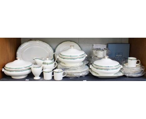 A Wedgwood 'Jade' Pattern Dinner Service, to include: a meat plate, three tureens and covers, a square serving dish, an oval 