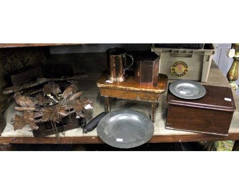 A German Cuckoo Clock, two pewter dishes, a small stool, a copper caddy and tankard, and a small mahogany box