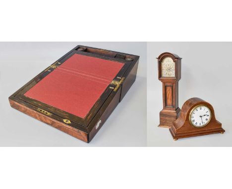 A Victorian Walnut Writing Slope, Edwardian mahogany inlaid mantel timepiece, circa 1900, and a miniature rosewood longcase c