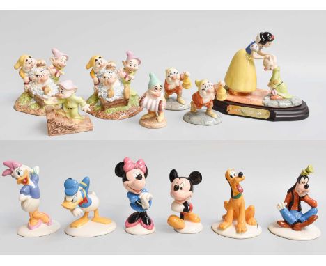 Royal Doulton Disney's "Snow White and the Seven Dwarfs" Figures, including: 'Dopey's First Kiss', SW21, limited edition 814/