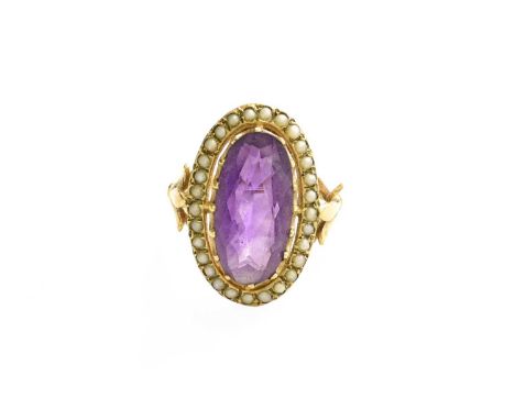 A 9 Carat Gold Amethyst and Split Pearl Ring, the oval cut amethyst within a border of split pearls, in yellow claw settings,