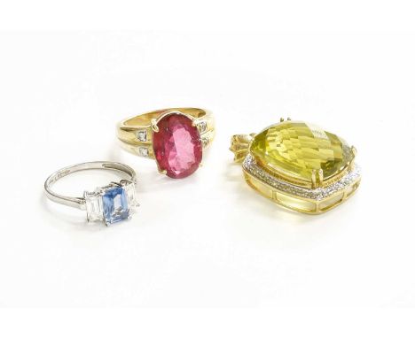 A 9 Carat Gold Coated Topaz Ring, finger size N; A 9 Carat White Gold Synthetic Blue Spinel Ring, finger size M1/2; and A 9 C