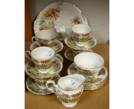 A Paragon The Old Mill Stream pattern six-setting tea service, comprising bread plate, milk jug, sugar bowl, teacups, saucers