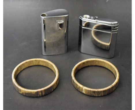 A 1970s Ronson chrome cigarette lighter; a 1950s chrome pocket cigarette lighter with torch; etc