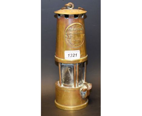 A brass miners lamp, The Protector Lamp and Lighting